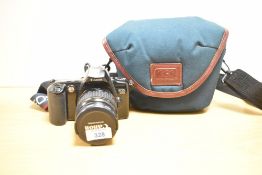 Canon EOS 500 SLR 35mm film camera, with a Canon 28-80mm f3.5-5.6 II lens.