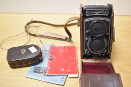 A Rolleicord Va Twin Lens Reflex Camera, (shutter not working) sold alongside a Weston Master IV