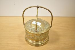 An early 19th-century brass hinged ice bucket, with an etched rose and floral design to lid and