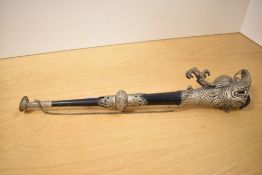 Thought to be 20th-century Tibetan white metal Rkangling ritual trumpet, featuring intricate