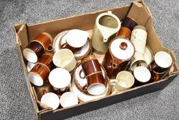 Two 20th-century Poole pottery tea services, featuring Broadstone and Chestnut, to include tea pots,