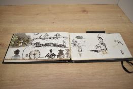 Manuscript. Pocket Sketch Book. Circa 1892. Contains numerous ink and watercolour sketches of a