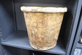 A large stitched and moulded vellum/rawhide storage or mill bucket, of tapering cylindrical form