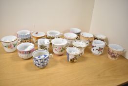A quantity of Victorian porcelain moustache cups, featuring a partial internal ledge to protect a