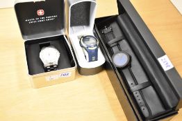 Three boxed wristwatches, comprising Lorus, Wenger Swiss Military and Movado
