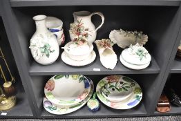 A large selection of 20th-century Italian ceramicware, including tableware adorned with decorative
