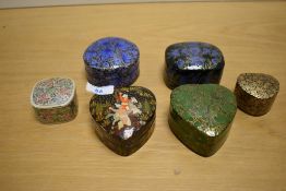 A quantity of 20th-century Oriental-style hand-painted papier-mâché trinket boxes, featuring