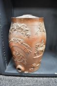 A Victorian salt-glazed stoneware spirit barrel, of traditional form, moulded in relief with the