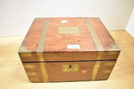 A Victorian brass-mounted walnut writing slope, the exterior plate engraved ‘TJC’ in gothic