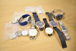 A collection of wristwatches and watch faces, including Garrard, Rotary, Zenith, Seiko and Fossil
