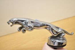 A 20th-century chromed metal Jaguar 'Leaping Cat' hood ornament, the form of which is an iconic