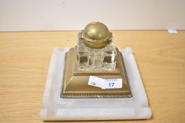 A Victorian onyx and brass desk stand inkwell, featuring a crystal cut glass well, engraved 'Ward