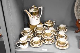 A 20th-century Japanese Koransha porcelain tea set, having floral and foliate decoration with hand