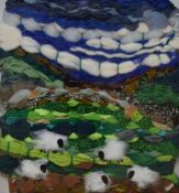 A Contemporary mixed media pastoral landscape with sheep created using a variety of fabrics,