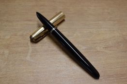 A Parker 51 vacumatic fill fountain pen in Black with Gold Fill converging line cap. Circa 1947. Cap