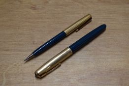 A Parker 51 aerometric fill fountain pen and clutch pencil set in Midnight Blue with Rolled Gold