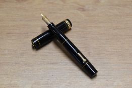 A Conklin Endura lever fill fountain pen in Black with a broad band on a ring cap with Conkin Endura