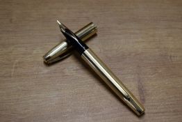 A boxed Sheaffer Imperial Touchdown fill fountain pen in Gold Fill with parallel line design
