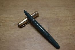 A Parker 51 aerometric fill fountain pen in Navy Grey with Gold Filled converging line cap. Circa
