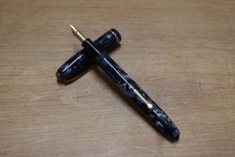 A Conway Stewart 85L lever fill fountain pen in Blue Marble with single cap band having Conway