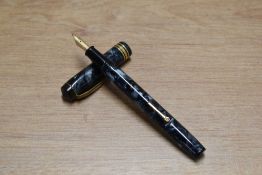 A Conway Stewart 388 lever fill fountain pen in Grey Marble with one broad and two narrow cap