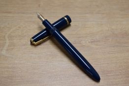 A boxed Parker Slimfold aerometric fill fountain pen in Blue with single decorative cap band