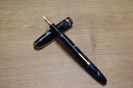 A boxed Conway Stewart 12 lever fill fountain pen in Blue Marble with Brown veining having Conway