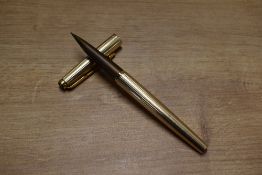 A boxed Parker Falcon Insignia converter fill fountain pen in Gold