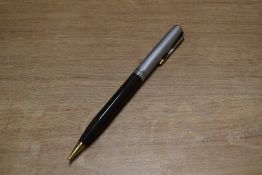 A Parker Vacumatic rotary pencil in Navy Grey with Sterling Silver engine turned lined cap with Gold