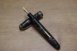 A Conway Stewart 58 lever fill fountain pen in Grey lined with a broad and two narrow cap bands