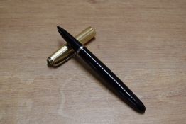 A Parker 51 vacumatic fill fountain pen in Black with Gold fill parallel line cap. Circa 1942.