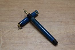 A Parker Pastel streamlined button fill fountain pen in Blue Moire with two band ring cap having