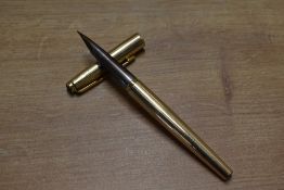 A boxed Parker 50 converter fill fountain pen in Rolled Gold Signet
