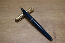 A Parker 61 Custom aerometric fill fountain pen in Teal with Rolled Gold cap