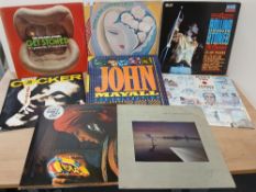 An eight album lot with titles by Derek and the Dominoes , The Rolling Stones , Rainbow and more