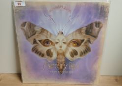 A Mercury Rev OG UK Press of ' The Secret Migration ' in VG+/VG+ showing light sleeve wear