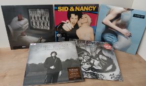 A Lot of five sealed records : Johnny Cash , PIL ( 12 inch single ) , Muse , Placebo , Sid and Nancy