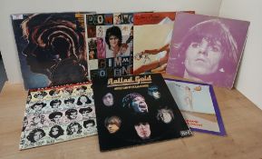 A Rolling Stones and related lot of seven record VG/VG or better - viewing in person is recommended