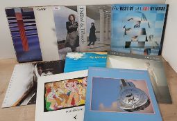 A lot of mixed vinyl albums (12) Dire Straits , Elton John and more - all been well looked after