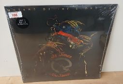 A Queens of the Stone Age ' in times new roman ' sealed and rare red vinyl album M/M