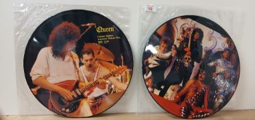 A Queen lot of two picture disc records - ' it's a hard life ' and the other being an interview