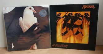 A lot of 2 Santana Albums which includes an EX/EX copy of the Greatest Hits on Simply Vinyl