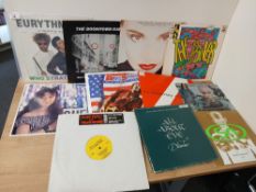 A lot of twenty five record - 10 inch and 12 inch singles : Robert Palmer , OMD , Eurythmics and