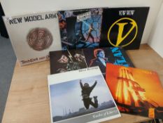 A mixed lot of seven records with New Model Army , Slade and more on offer here - VG+ or better in