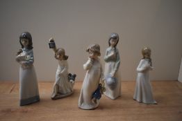 A group of five Nao by Lladro porcelain figurines to include 'My Rag Doll' model number 1108, 'Who