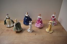 A group of seven Royal Doulton bone china figurines comprising Pretty Ladies 'Alexandra' HN 4928,