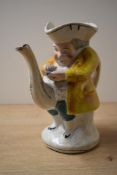 A 19th century 'Snuff-Taker' Toby Jug, formed as a teapot, having no markings or signatures,