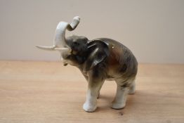 A Royal Dux bone china elephant study, bearing stamp '378 and 927' to underside but no pink