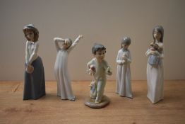 A group of five Nao by Lladro porcelain figurines to include 'Girl with Purse' and 'A New Doll'