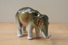 A Royal Dux bone china elephant study, bearing stamp '672 and 45' to underside with pink triangle,